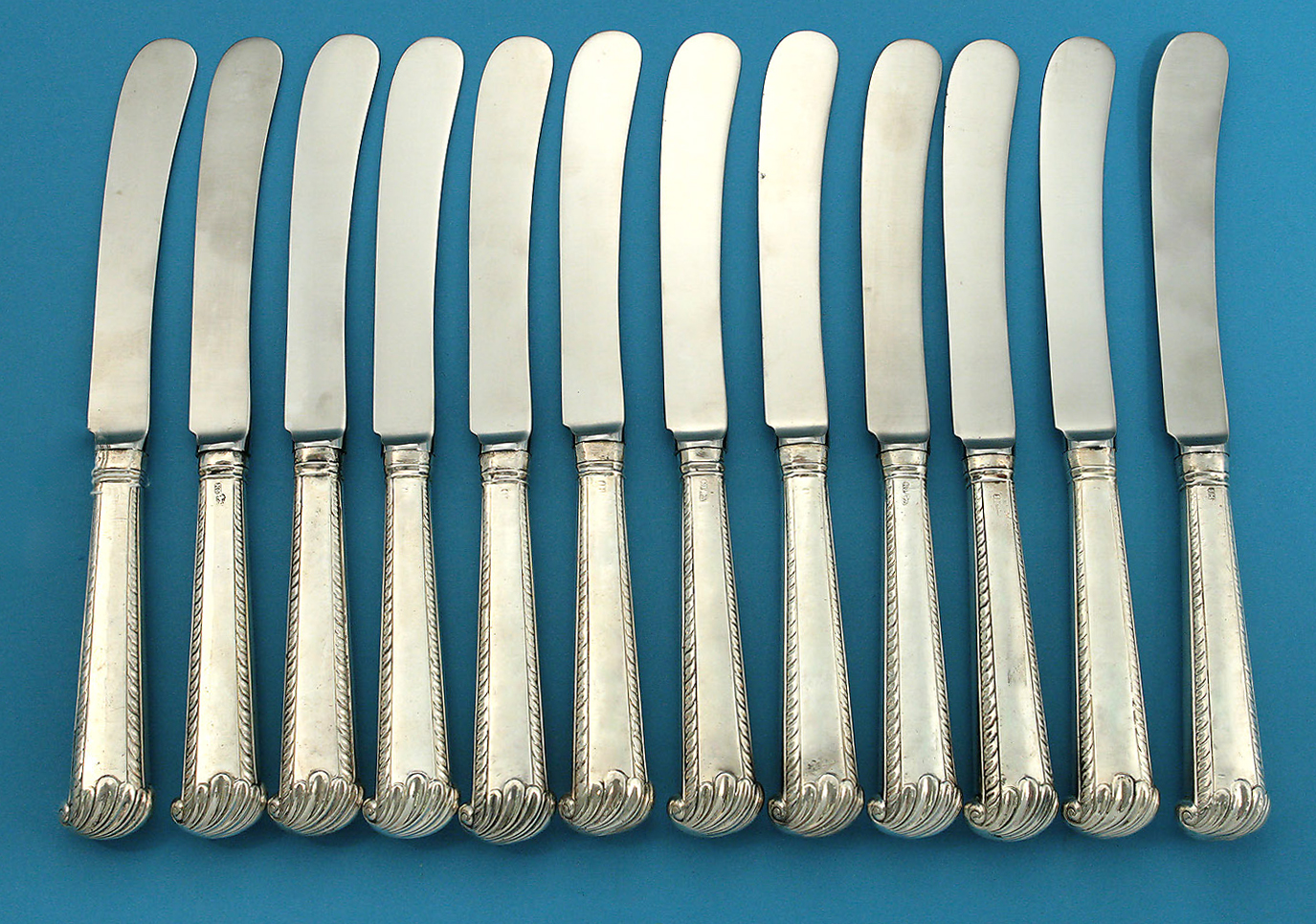 Straight Set 12 George III Table Knives, Tricket